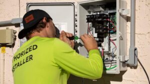 HVAC technician inspecting a residential system during a service visit