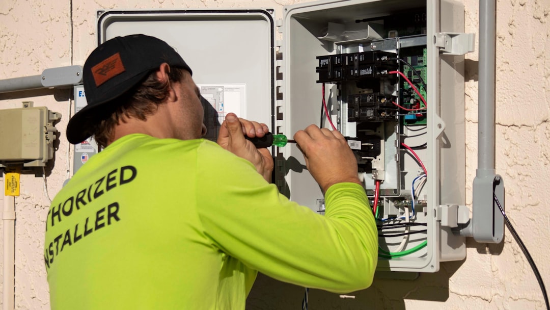 HVAC technician inspecting a residential system during a service visit